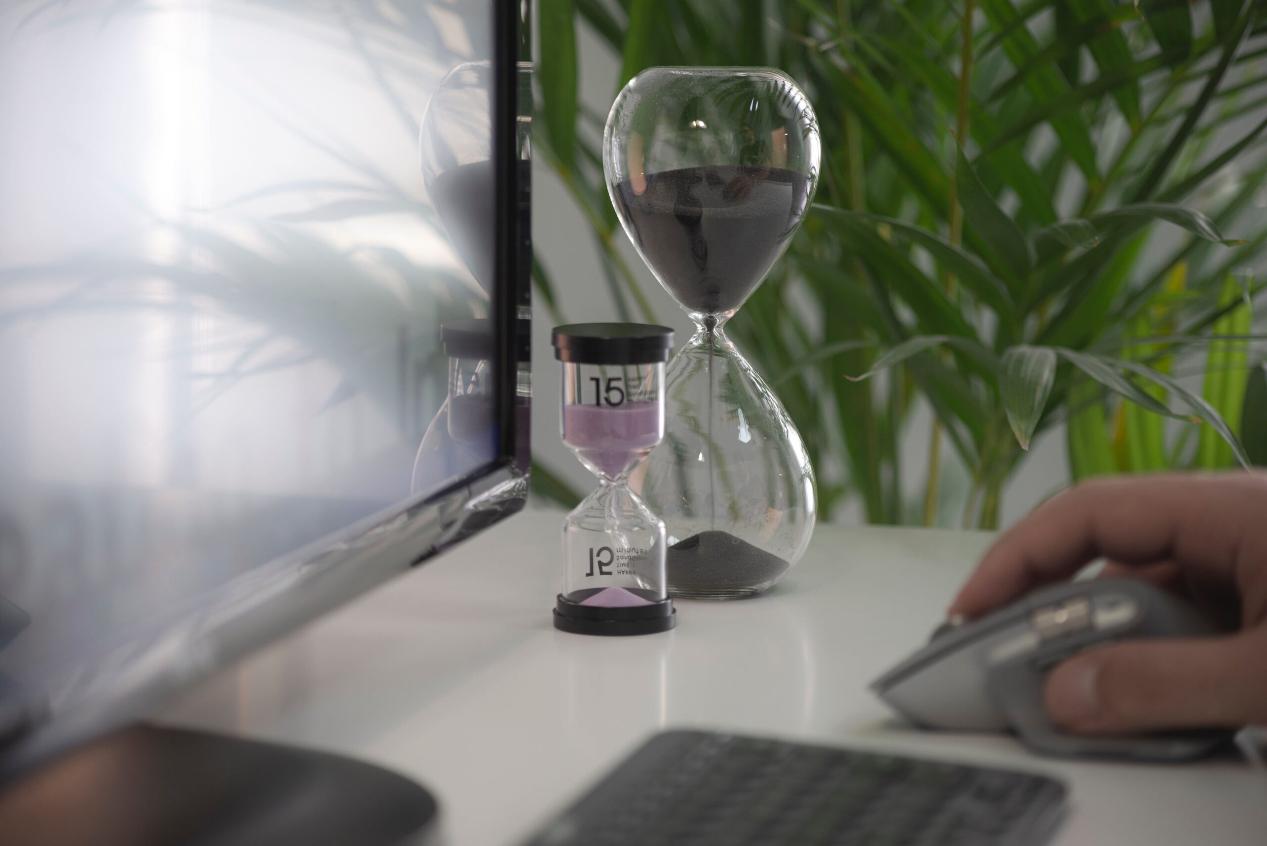 Sandglass on computer table